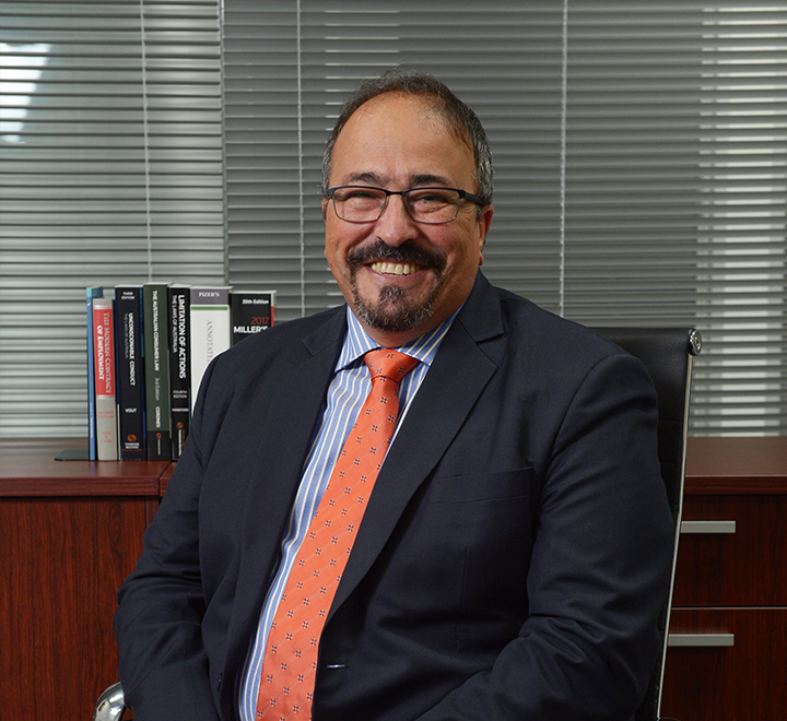 Experienced lawyer sitting in chair