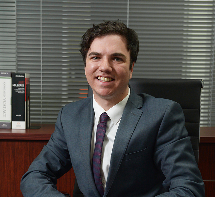 Young lawyer sitting in office